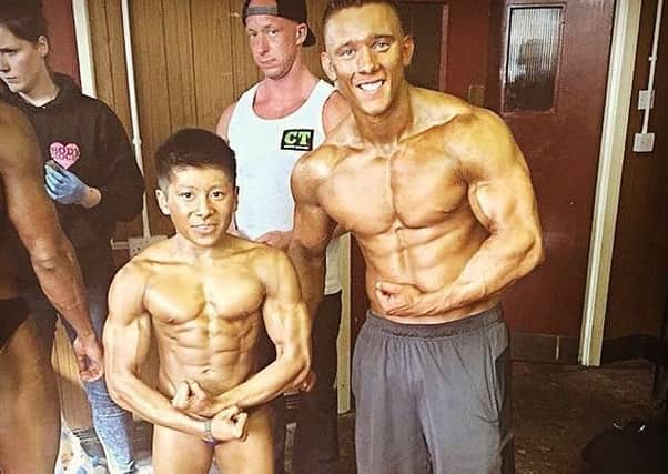 Choon Tan, 21, from Bognor, believed to be the smallest bodybuilder at 4ft 10in tall SUS-150930-111647001
