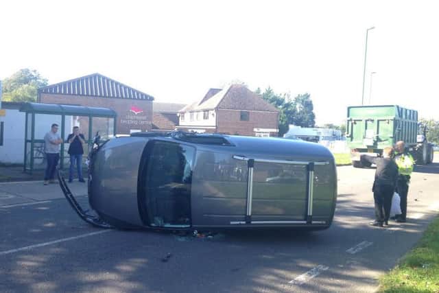 The overturned VW Caddy involved in a crash in Bosham PICTURE BY PAUL PALFREY SUS-150930-142622001