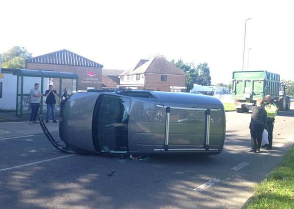 The overturned VW Caddy involved in a crash in Bosham PICTURE BY PAUL PALFREY SUS-150930-142622001