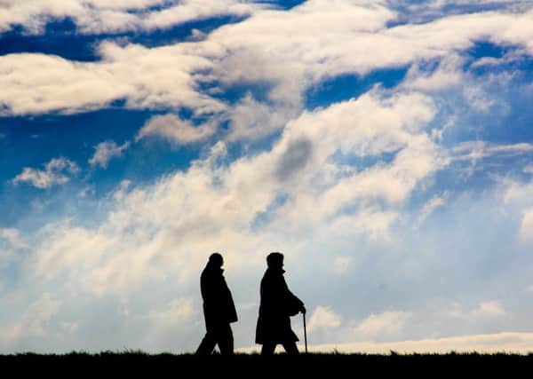 Ella Penns entry, titled Love is the Journey, reveals the shadow of an older couple walking behind one another on a cloudy day