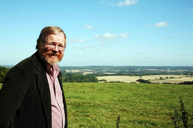 Picture of author Bill Bryson enjoying the South Downs SUS-150110-161110001