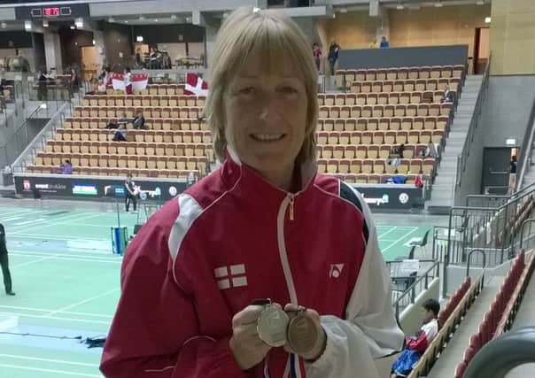 Cathy Bargh with her pair of medals at the World Seniors Badminton Championships in Sweden