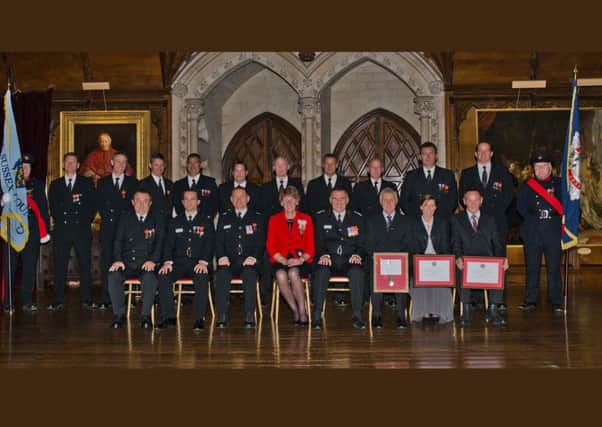 Firefighters given medals by the Lord Lieutenant of West Sussex at Arundel Castle on October 1. Picture by Eddie Howland