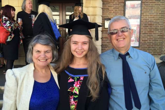 Fiona Setford with her mum Frances and dad Malcolm at Northbrook College's graduation ceremony in Worthnig SUS-150210-154120001