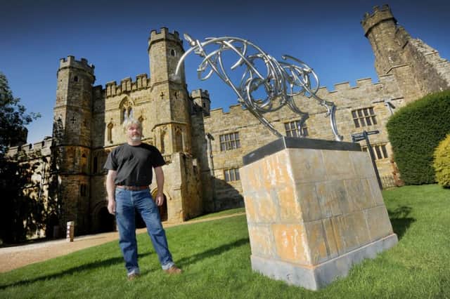 Sculptures at Battle Abbey, 30/9/15

Artist in residence Guy Portelli with his work. SUS-150930-154901001