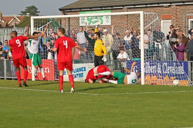 Sami El-Abd bundles in the winner after reacting to his header coming back off the bar / Picture by Tim Hale