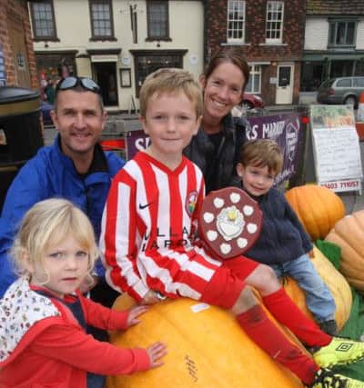 Thel Pumpkin competition - the winning family, Adrian and Claire Ridley and their children Jacob, 7, and twins Noah and Mabel, 3. Photo by Derek Martin SUS-150410-231433008
