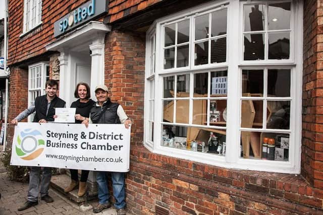 The annual Steyning shop window competition - third place -  Jess Denny owner of Spotted (middle) with Jack Dunckley (left) and Dean Haysom (Steyning & District Business Chamber Vice Chair) right SUS-150610-101229001