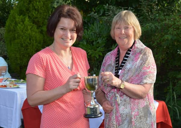 Battle Town Council, Battle in Bloom Awards 2015, presentations at The Almonry July 23rd 2015
Best Floral Display by a restaurant, tthe Thorpe Trophy.  Bluebells Cafe Tea Room, Received by Tina Baker
Presented by Cllr Margaret Kiloh SUS-150724-091053001