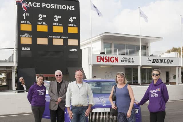 Rolls Royce driver Alan Lavender with lucky ticket winners Nigel and Rusty Hanlon and Together for Short Lives pair Rosanna Oliver-Black and Lorna Gray