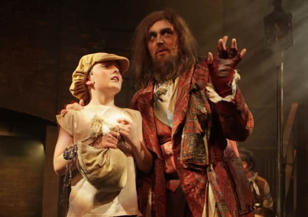 Oliver (Harvey Thorne) and Fagin (Simon Fellingham). Picture by Stephen Candy