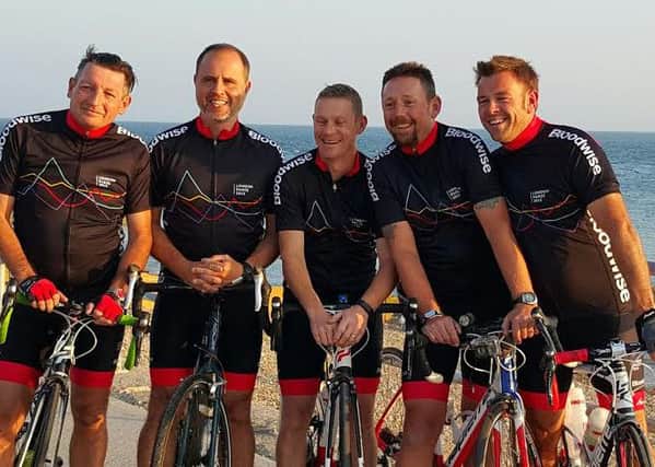 The team cycled from Selsey to London to Paris for cancer research