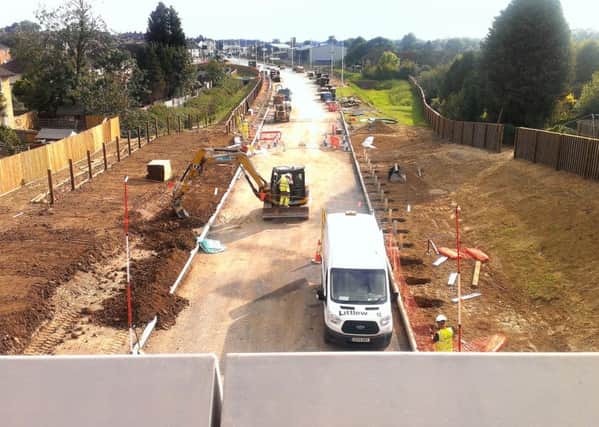 9/9/14- Progress on the Bexhill to Hastings Link Road (BHLR) pictured in 2014.  View south from Woodsgate Park Bridge to Little Common Road in Bexhill.  The road foundations been laid, almost ready for the top layer of tarmac. SUS-140909-172022001