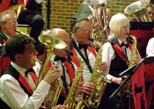 Members play a wide range of music, from traditional marches and brass band music to popular music