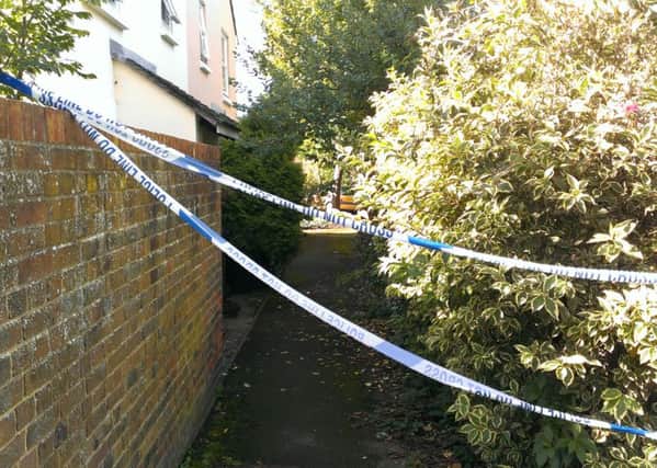 Police tape remains after last night's evacuation of Woodfield Close