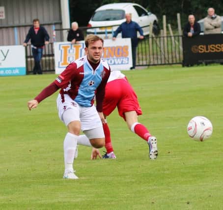 Sponsor's man of the match Tom Vickers in action for Hastings United against Poole Town yesterday. Picture courtesy Joe Knight