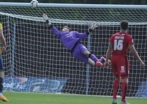 Oxford Utd V Crawley Town - Freddie Woodman makes a spectacular save to deny Oxford victory in the dying seconds of the match (Pic by Jon Rigby) SUS-150908-125257008
