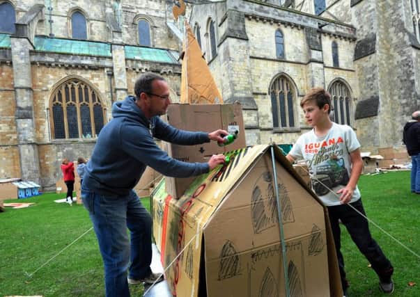 Damon and Lars Evison with their model of Chichester Cathedral. ks1500510-8 SUS-151010-225208008
