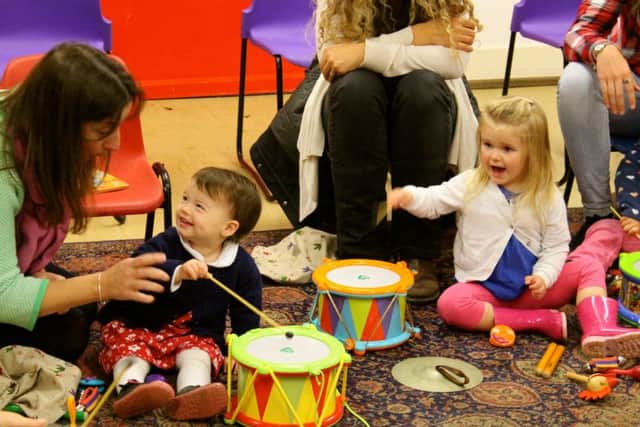 Children at Singing Kettles play with an enormous range of sound-making toys