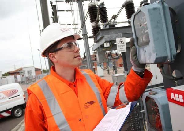 UK Power Networks engineer working to maintain power supplies SUS-151007-133426001