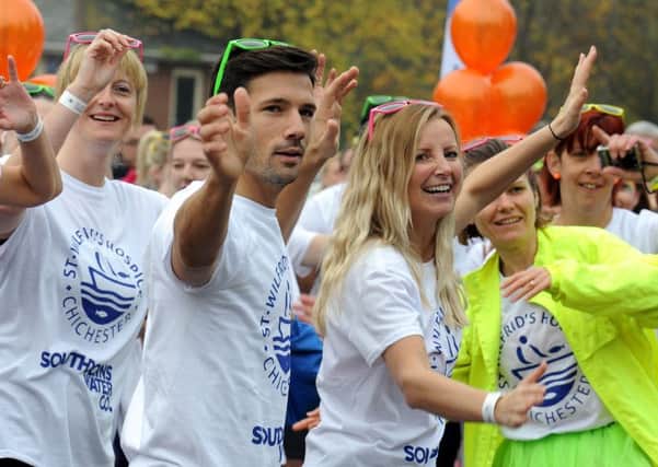 Former Hollyoaks stars Danny Mac and Carley Stenson get into the spirit of the colour run
