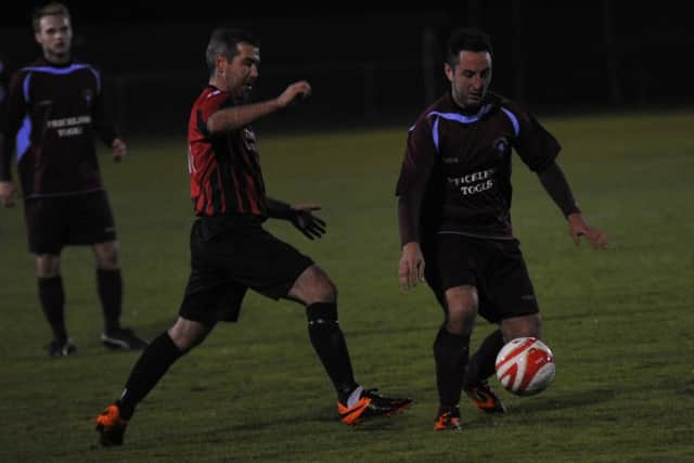 Ricky Mote on the ball for Little Common during their 4-3 extra-time victory at home to Oakwood on Tuesday night. Picture by Simon Newstead (SUS-151014-105517002)