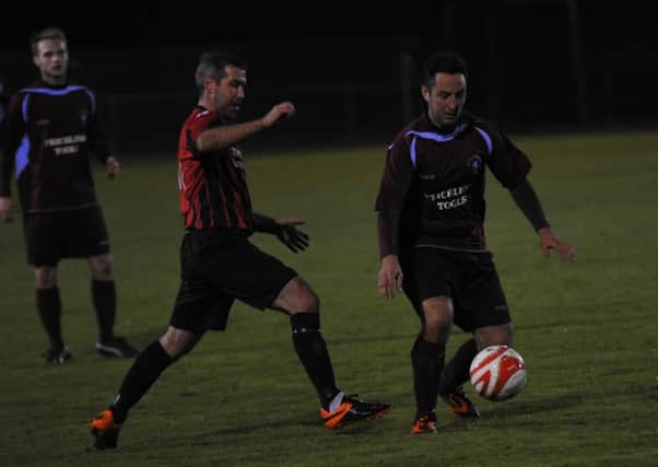 Ricky Mote on the ball for Little Common during their 4-3 extra-time victory at home to Oakwood on Tuesday night. Picture by Simon Newstead (SUS-151014-105517002)