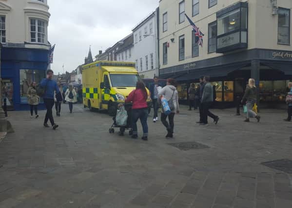 A woman in her 20s was examined by paramedics in Chichester this afternoon (October 16)