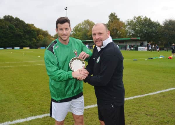 Scott Kirkwood and Ian Chapman after the former recently reached 100 appearances.