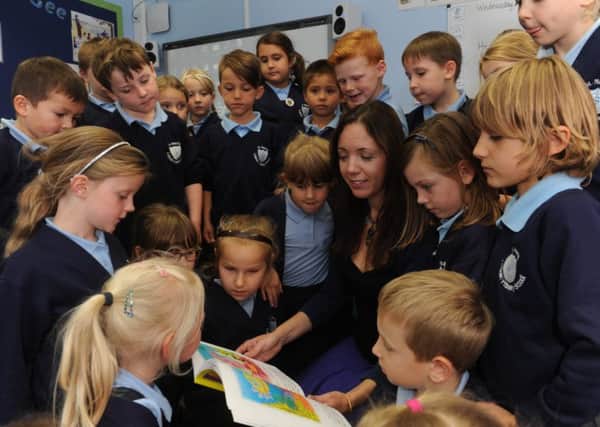 Author Corrina Holyoake reads her first book at St Marys Catholic School ks1500522-1