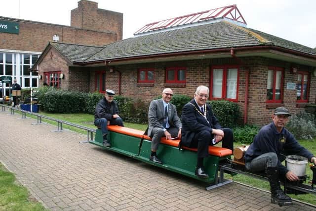 David Siggs, last year's Chichester deputy mayor, escorted by Lion president Tony Harrison as they ride with driver Alan Edwards from Chichester and District Model Engineers