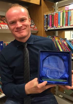 Russell Allen - who works as a Team Leader for Childrens Services across the West Sussex Library Service - received the Public Librarian of the Year award from the Public and Mobile Libraries Group of CILIP (Chartered Institute of Library and Information Professionals). SUS-151020-123036001
