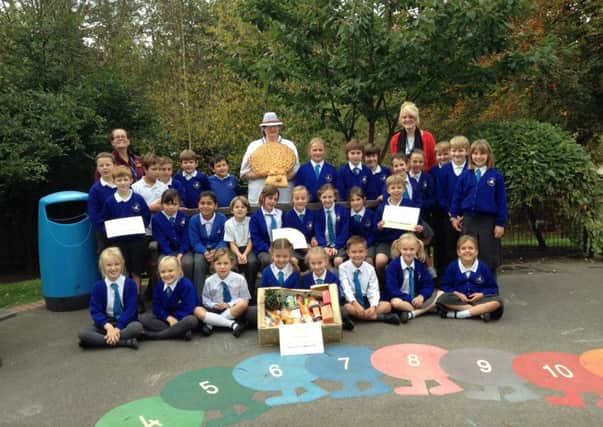 Sainsbury's Horsham supports St Marys CE Primary School's harvest SUS-151021-102302001