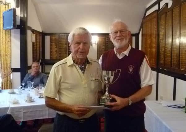 Clive Millett receives the prize at Bognor