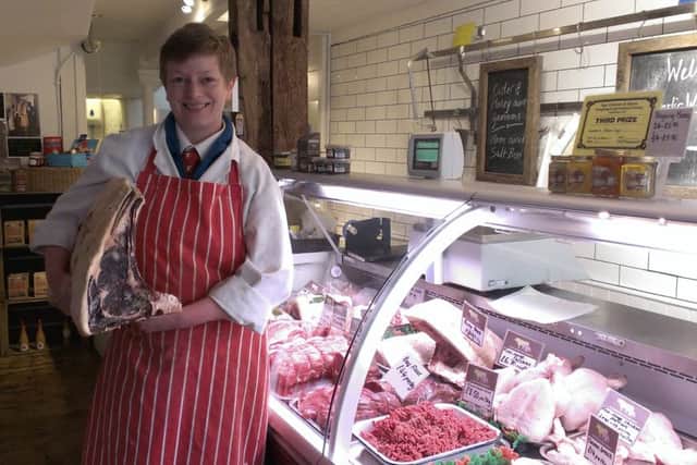 Garlic Wood Farm Butchery shop manager Liz Vande Putte with a beef loin