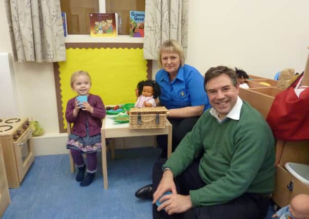 Horsham MP Jeremy Quin at Catkins Nursery Horsham SUS-151027-160616001