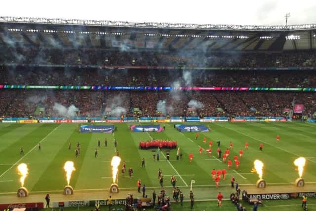 The Games Maker Choir on the pitch at Twickenham for the South Africa v Wales quarter final match on October 17