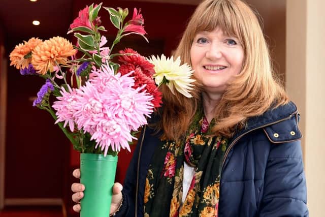 Cup winner Jayne Pumfrey with cut flowers from her garden LP1502337