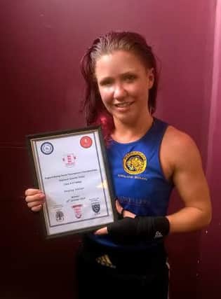 Hayley Weller with her Southern Counties certificate