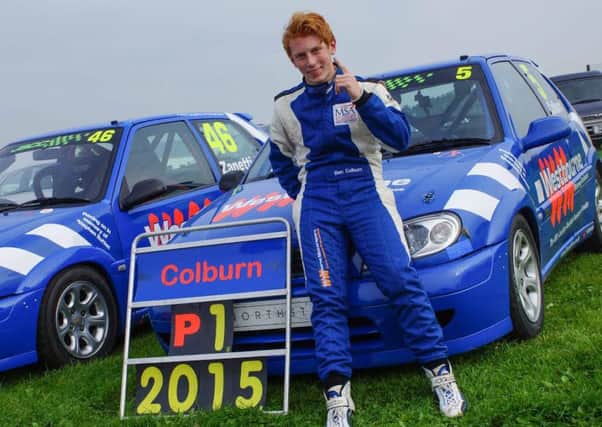 Ben Colburn celebrates winning the Junior Saloon Car Championship