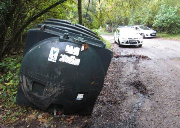 The leaking oil tank dumped outside Horsham Rugby Club