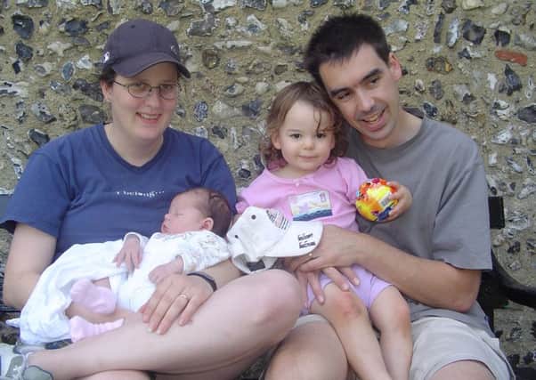 Helen and John Cookson with their beautiful daughters, Rebecca and Rachel, before their deaths