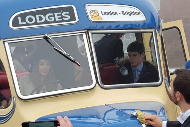Alex Jones driving one of the Children in Need buses