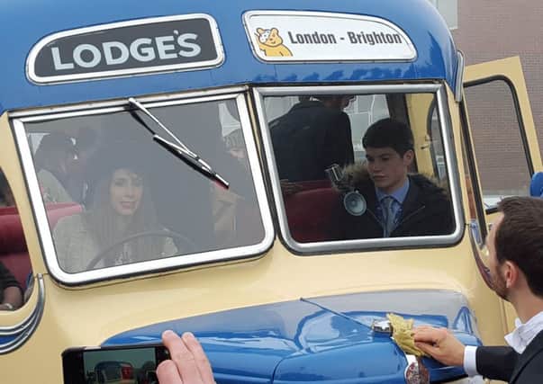 Alex Jones driving one of the Children in Need buses