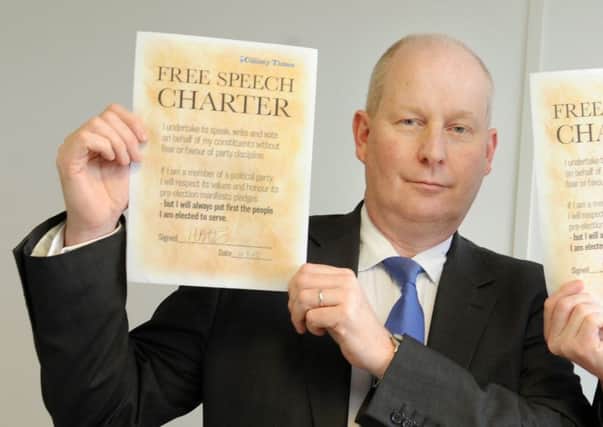 Adrian Lee signing the County Times' Free Speech Charter earlier this year