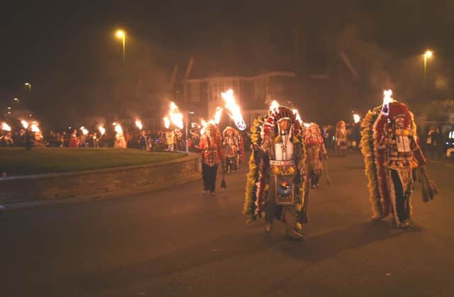 Littlehampton Bonfire Society leads the torchlight part of the procession