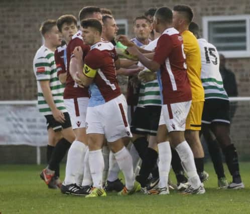 Things get heated during Hastings United's victory away to Chipstead in the FA Trophy on Saturday. Picture courtesy Joe Knight