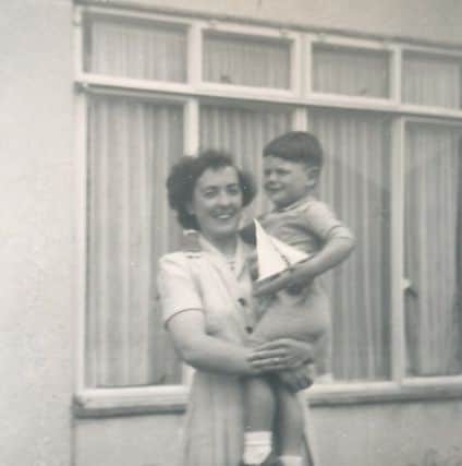 Donald with his Aunt Mary, outside the front door of 42 Chesterfield Road around 1952