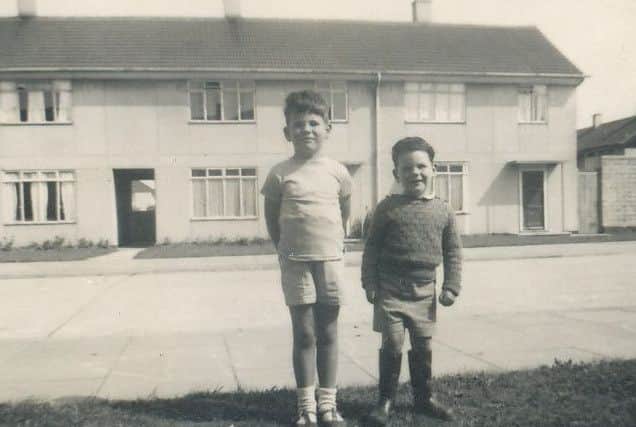 Donald with brother John, round the corner from Chesterfield Road, possibly outside the Wilson's home, around 1954