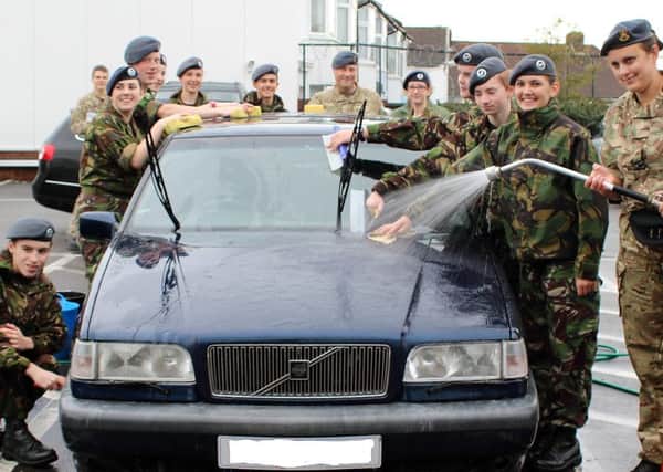 Steyning Air Cadets armed with charitable sponges and buckets at Mayberry Garden Centre in Portslade
